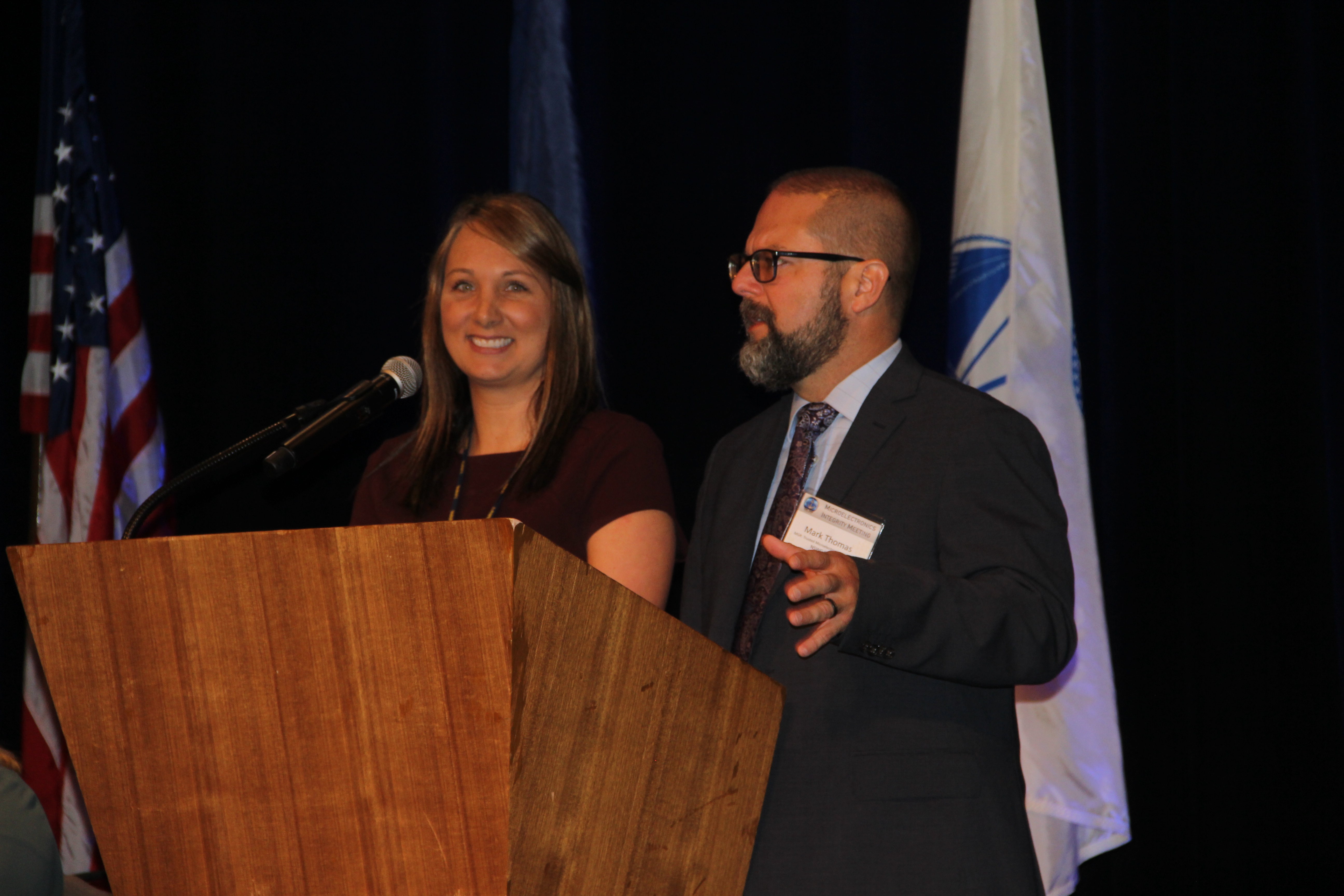 Dr. Julie Shaff (left) moderates a panel with Mark Thomas (right)